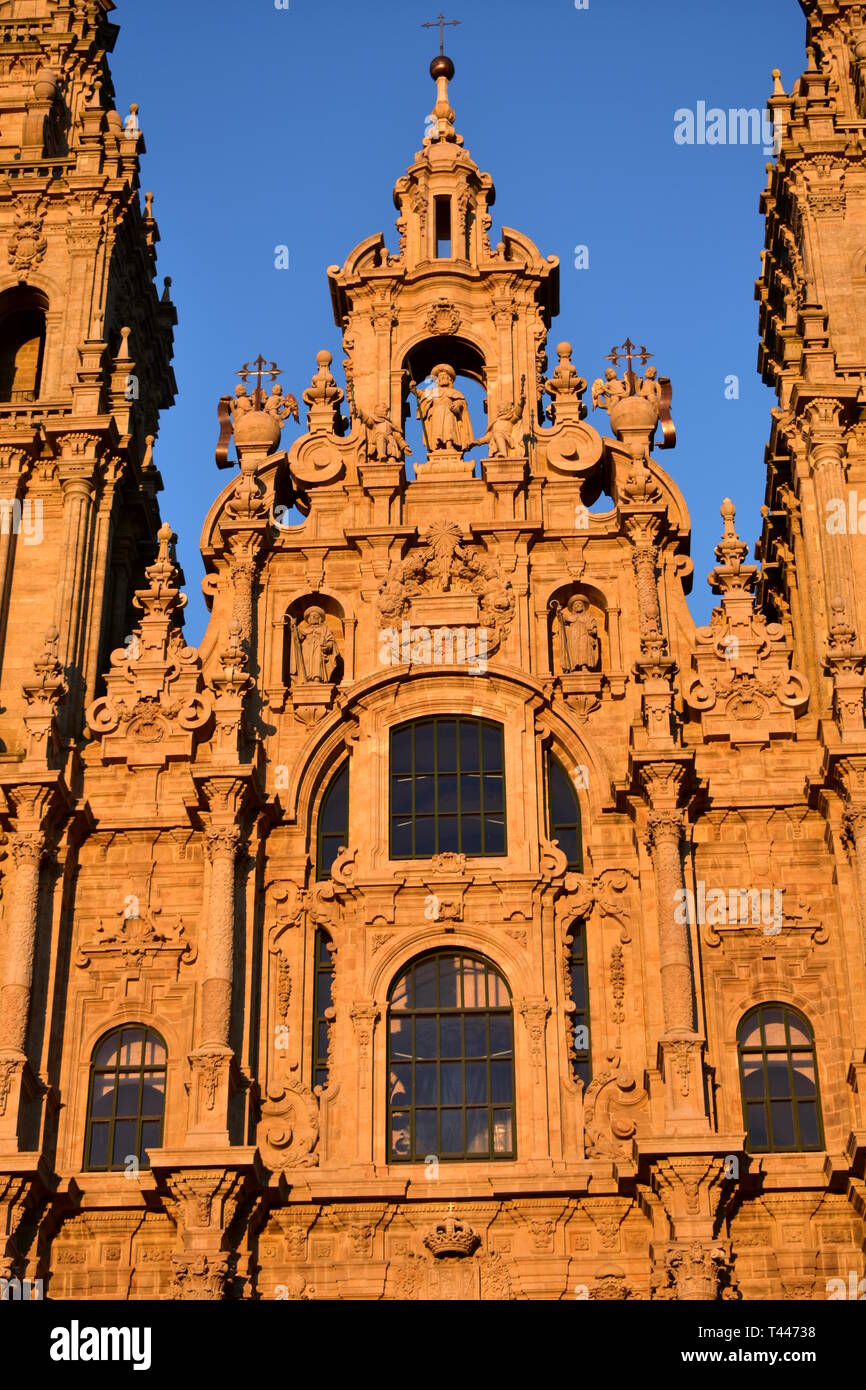 Santiago de Compostela, Spain. Cathedral, facade close up with sunset light and blue sky. Stock Photo