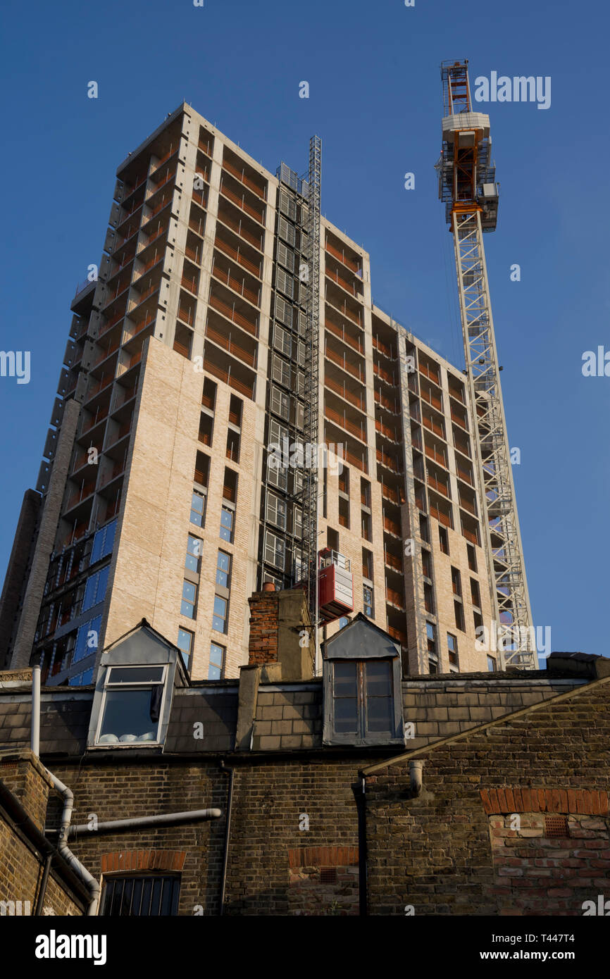 Building construction of new shopping mall and luxury apartments in