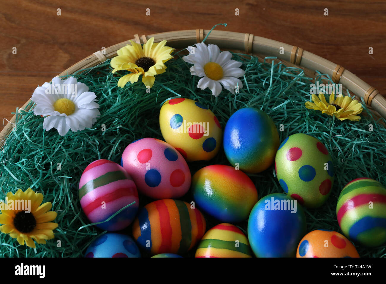 Easter traditions. Compositions with painted Easter eggs. Stock Photo