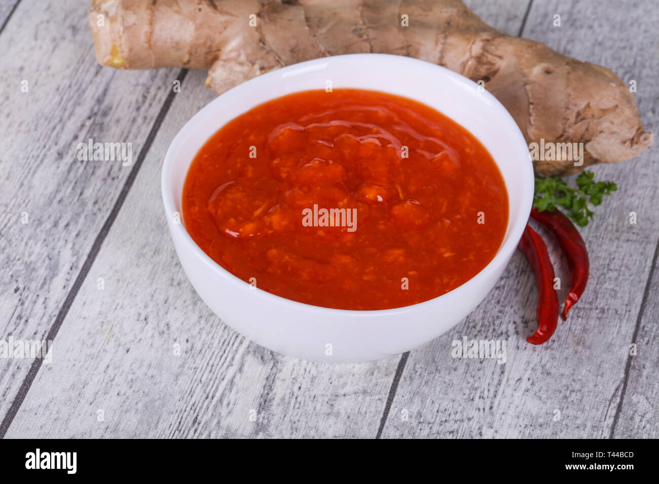 Ginger chili sauce with root and pepper Stock Photo - Alamy