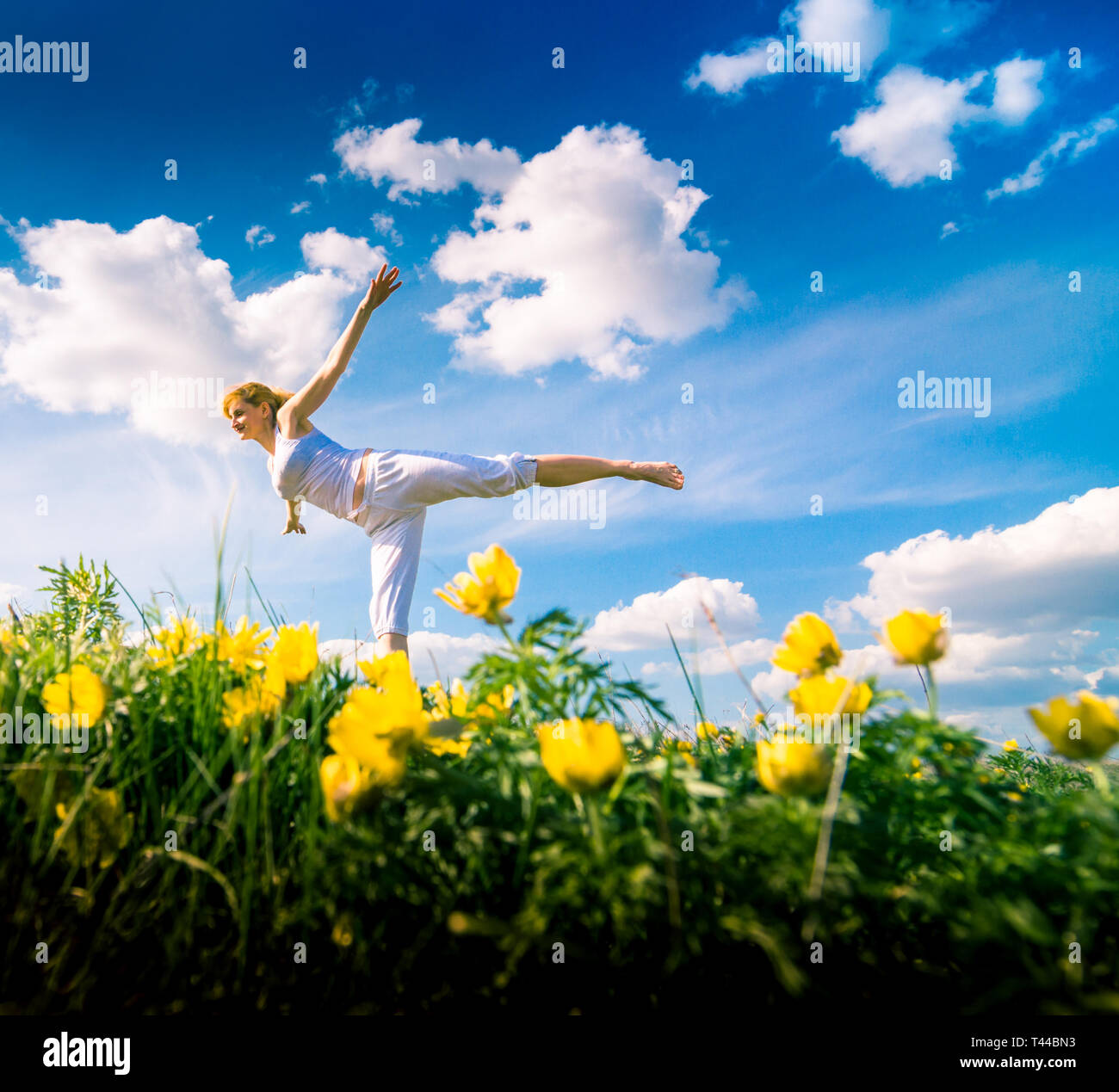 Girl practicing yoga hi-res stock photography and images - Alamy