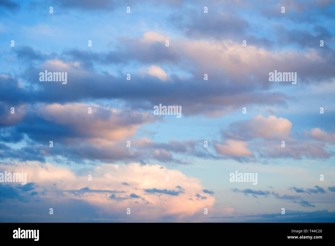 Blue sky background. Dramatic sunset cloudy sky with picturesque clouds ...