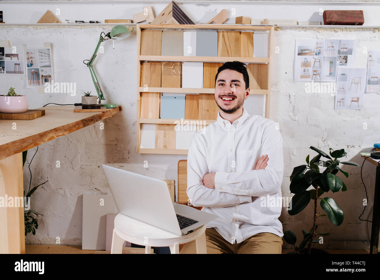 Environmental portrait of a furniture designer maker in his