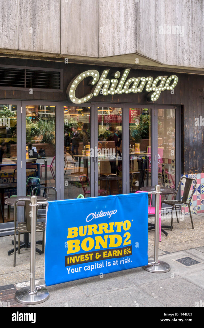 An advertisement for Chilango Burrito Bonds outside a Chilango Mexican restaurant in Holborn, London. Stock Photo