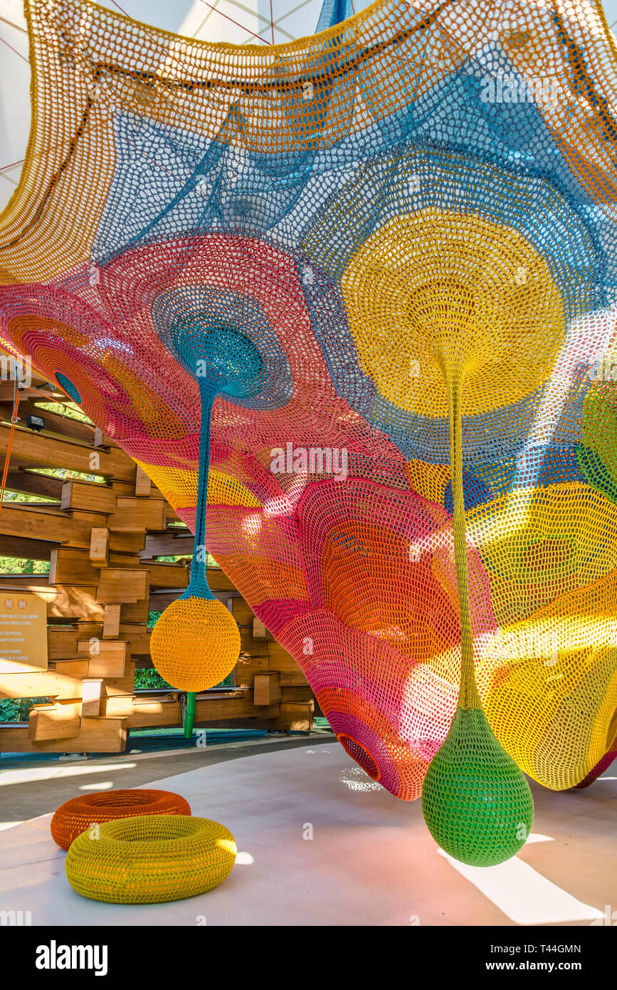 Colurful playground inside the Woods of Net sculpture by Toshiko