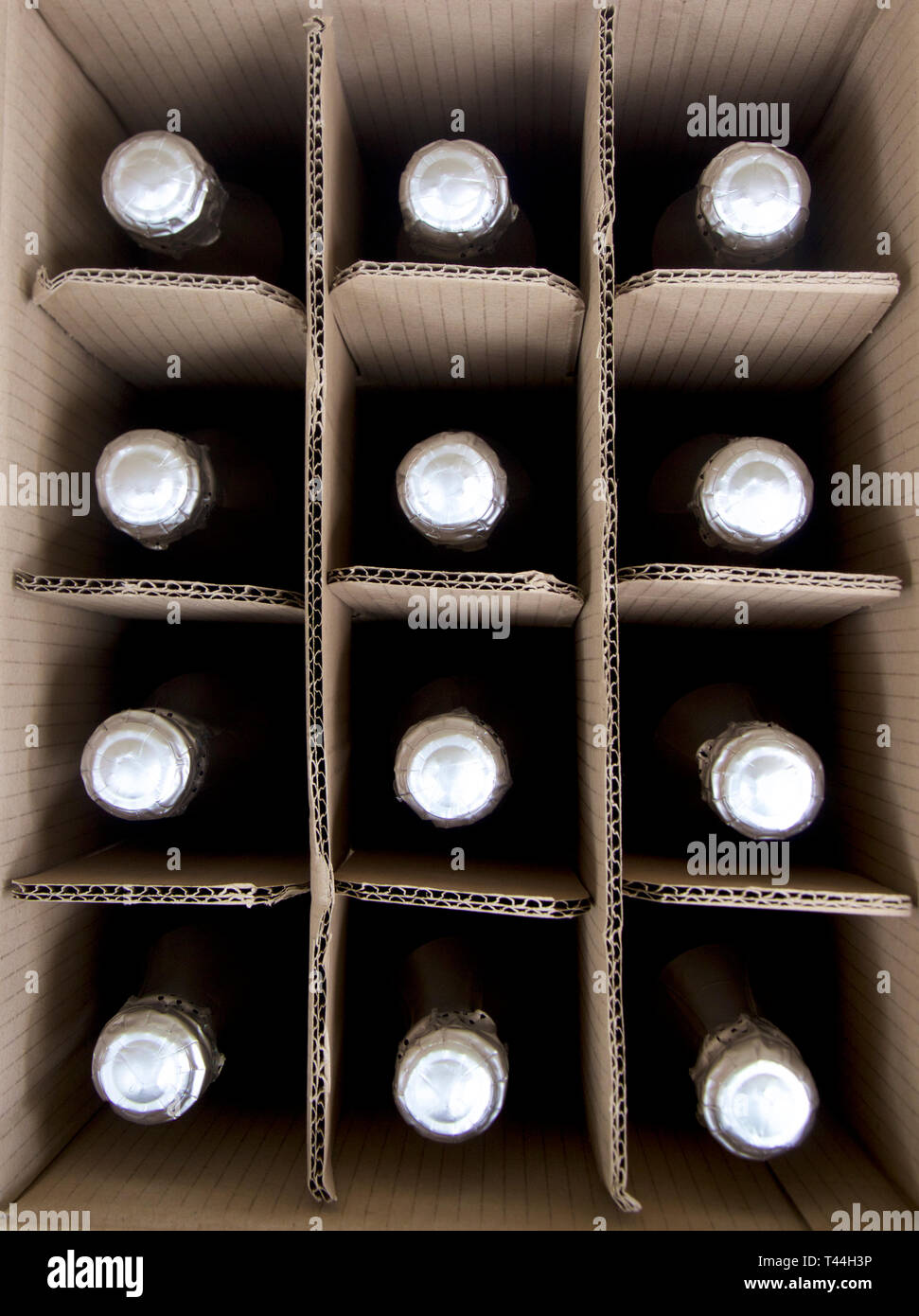 Cardboard case with twelve bottles of wine. Stock Photo