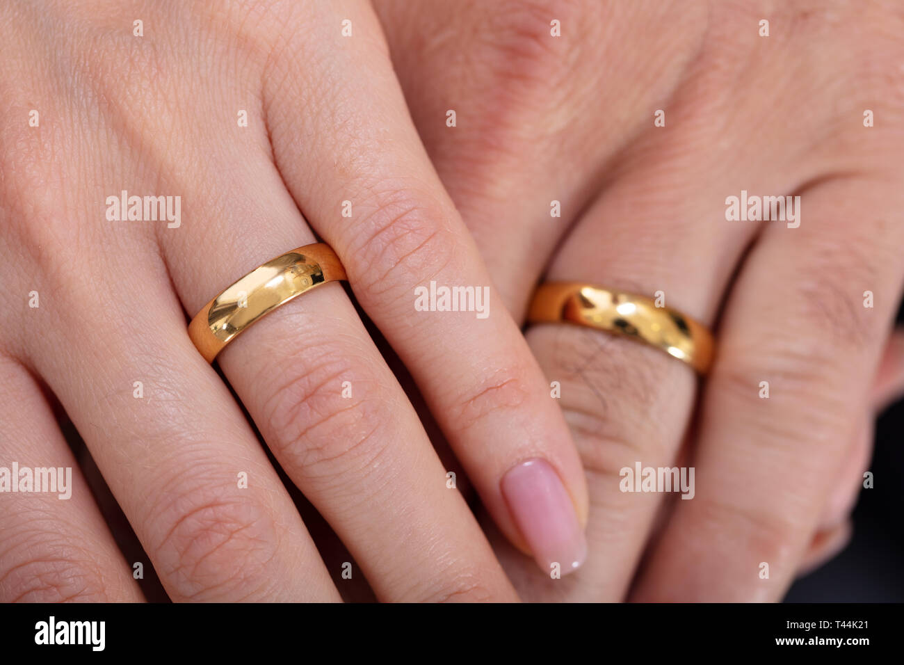 Couple rings deals with hands