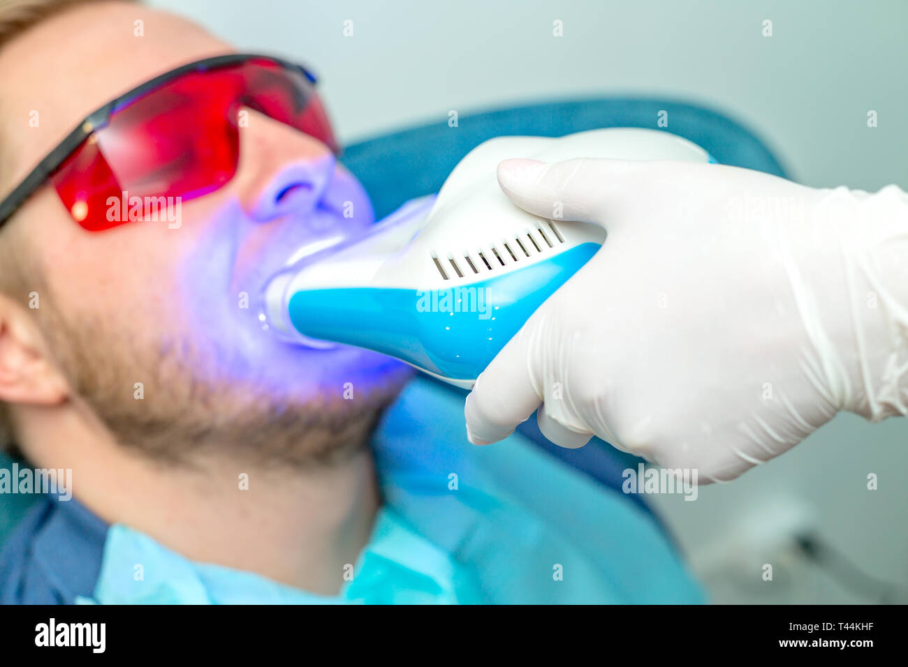 UV whitening teeth procedure. Dental care concept Stock Photo Alamy