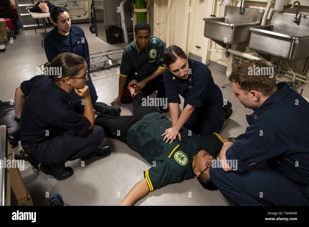 GULF OF THAILAND (Feb. 20, 2019) – Hospital Corpsman 3rd Class Leticia Luna, from Long Beach, Calif., demonstrates proper cardiopulmonary resuscitation (CPR) procedures on a simulated patient aboard the amphibious transport dock ship USS Green Bay (LPD 20) during a medical training evolution. Green Bay, part of the Wasp Amphibious Ready Group, with embarked 31st Marine Expeditionary Unit (MEU), is in Thailand to participate in Exercise Cobra Gold 2019. Cobra Gold is a multinational exercise co-sponsored by Thailand and the United States that is designed to advance regional security and effecti Stock Photo