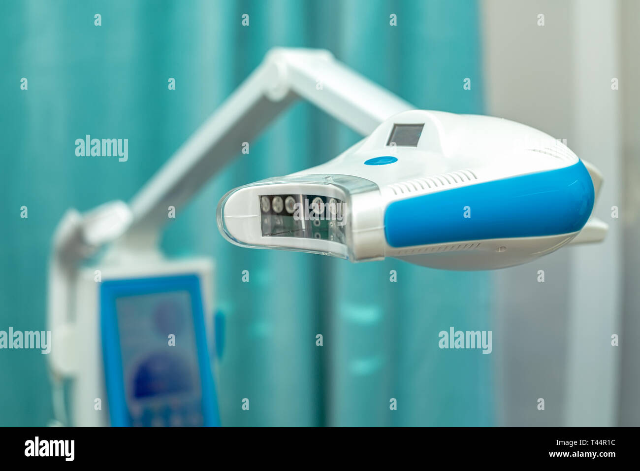 Dental clinic profesional teeth whitening lamp. Dental care concept