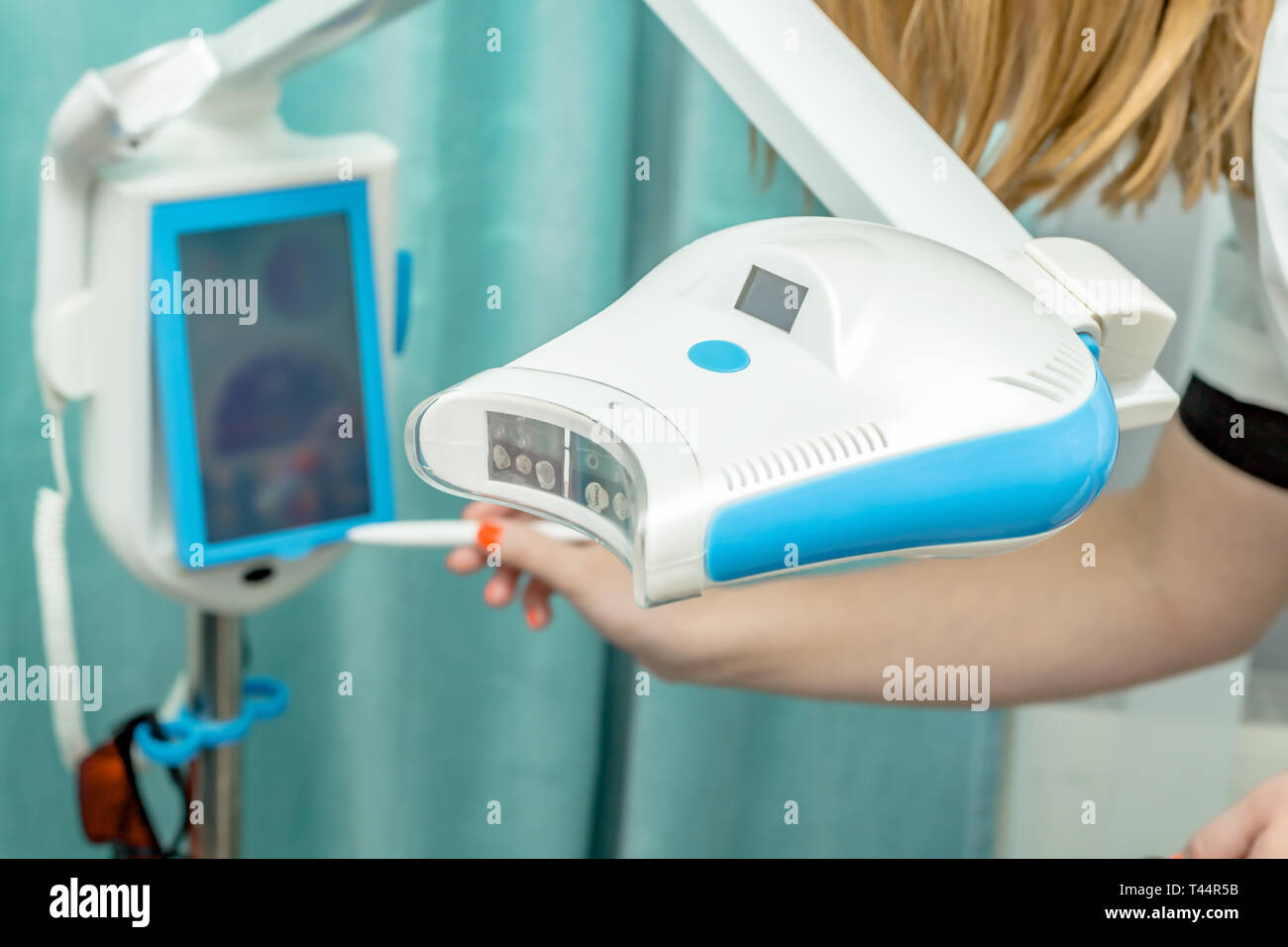 Dental clinic profesional teeth whitening lamp. Dental care concept