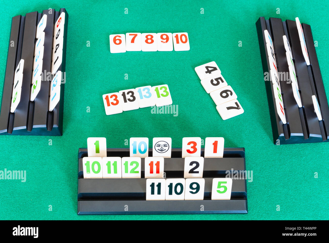 MOSCOW, RUSSIA APRIL 3, 2019 gameplay of Rummikub tilebased game on