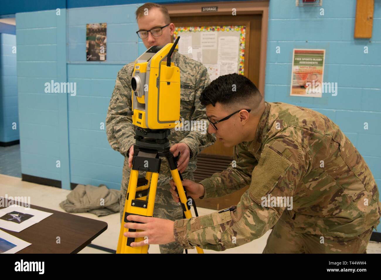 Senior Airman Blair Santiago 5th - Senior Airman Blair Santiago 5th Civil Engineer Squadron Engineering Assistant Sets Up A Total Station Inside Memorial Middle School On Minot Air Force Base North Dakota Feb 22 2019 Total Stations Create Maps By Collecting Geospatial Data Of The Area T44WW4 