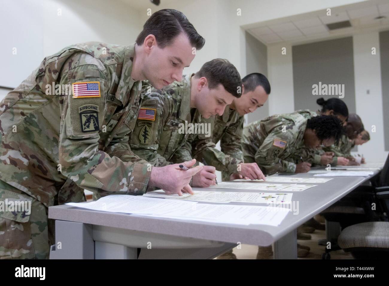 officers (NCOs) of U.S. Army and U.S. Army Reserve sign the NCO creed at the