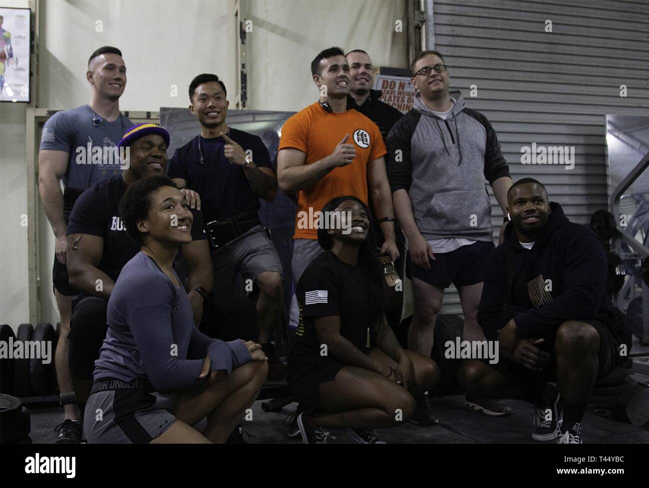 Soldiers from the 300th Sustainment Brigade take a picture after competing in the deadlift competition on Camp Arifjan, Kuwait, Feb. 24, 2019. Stock Photo