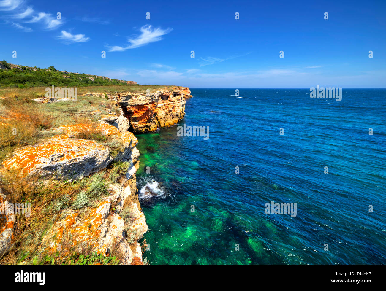 Stunningly beautiful landscape with rocky shore and blue sea Stock ...