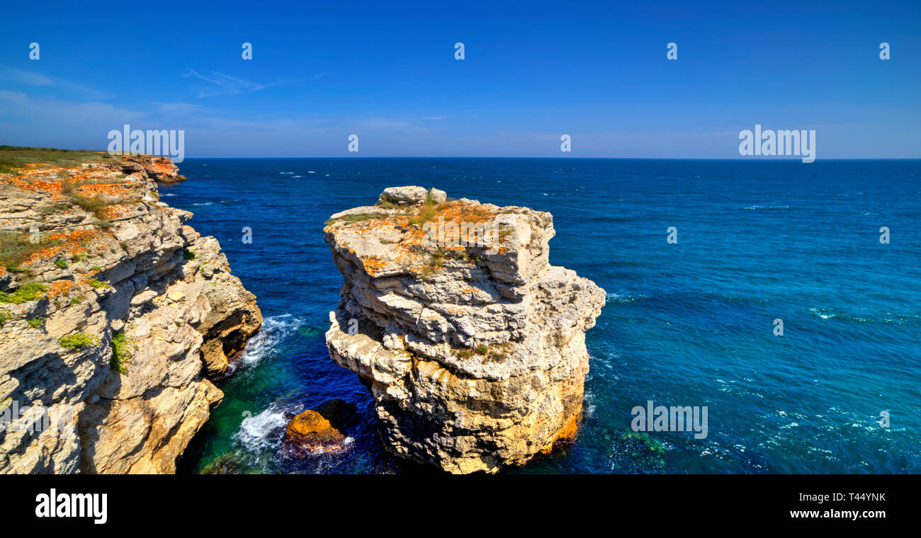 Stunningly beautiful landscape with rocky shore and blue sea Stock ...