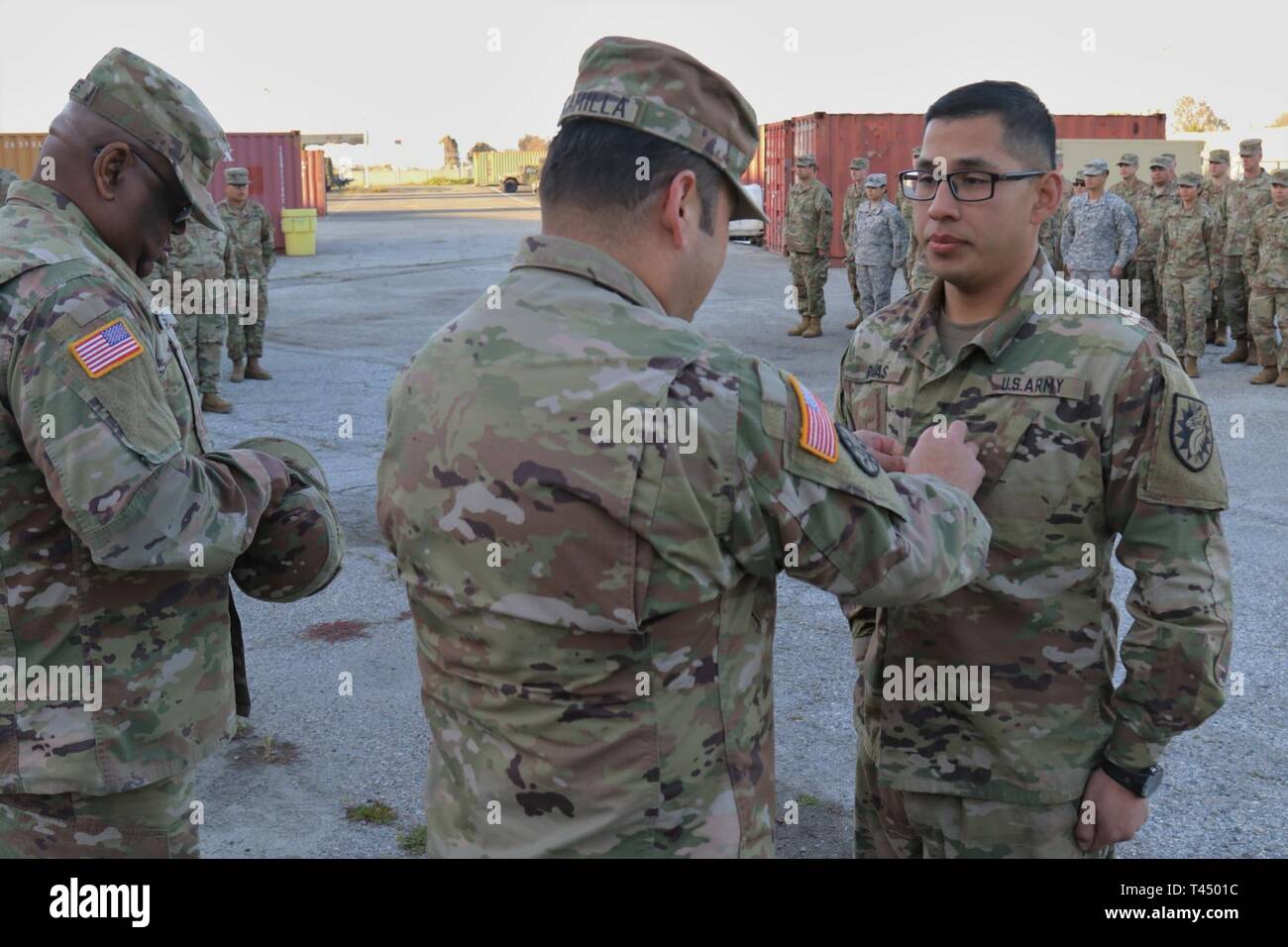 U.S. Army Cpl. Jose Rivas, right, wheeled vehicle mechanic assigned to