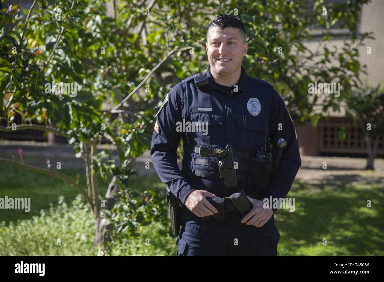 Daniel Vasquez, accident investigator with the Provost Marshal Office, Security and Emergency Services Battalion, Marine Corps Base (MCB) Camp Pendleton, patrols a residential housing area at MCB Camp Pendleton, California, Feb. 25, 2019. Vasquez was conducting a routine patrol to ensure the safety and security of property and personnel at MCB Camp Pendleton. Stock Photo