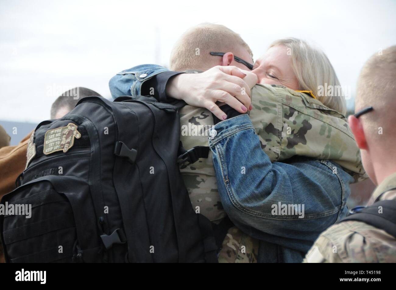 Pfc. Hayden Johnson, of 1st Battalion, 98th Calvary Regiment, is welcomed home at Thompson Field in Flowood, Mississippi, Feb. 26, 2019. Johnson, of New Albany, was part of a contingent of the Mississippi Army National Guard’s 155th Armored Brigade Combat Team returning home after serving in Kuwait in support of Operation Spartan Shield for approximately one year. The arrivals, with Soldiers from various brigade subordinate units, are a portion of a series of flights that will return brigade Soldiers home through the end of March. Stock Photo