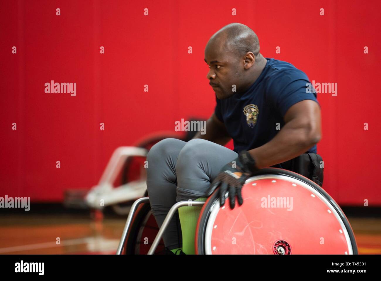 U.S. Navy Petty Officer 1st Class Sky SaintLouis participates in a drill at wheelchair rugby practice during the 2019 Marine Corps Trials at Marine Corps Base Camp Pendleton, California, Feb. 27. The Marine Corps Trials promotes rehabilitation through adaptive sports participation and serves as the primary venue to select Marine Corps participants for the DoD Warrior Games. (Official U.S. Marine Corps Stock Photo