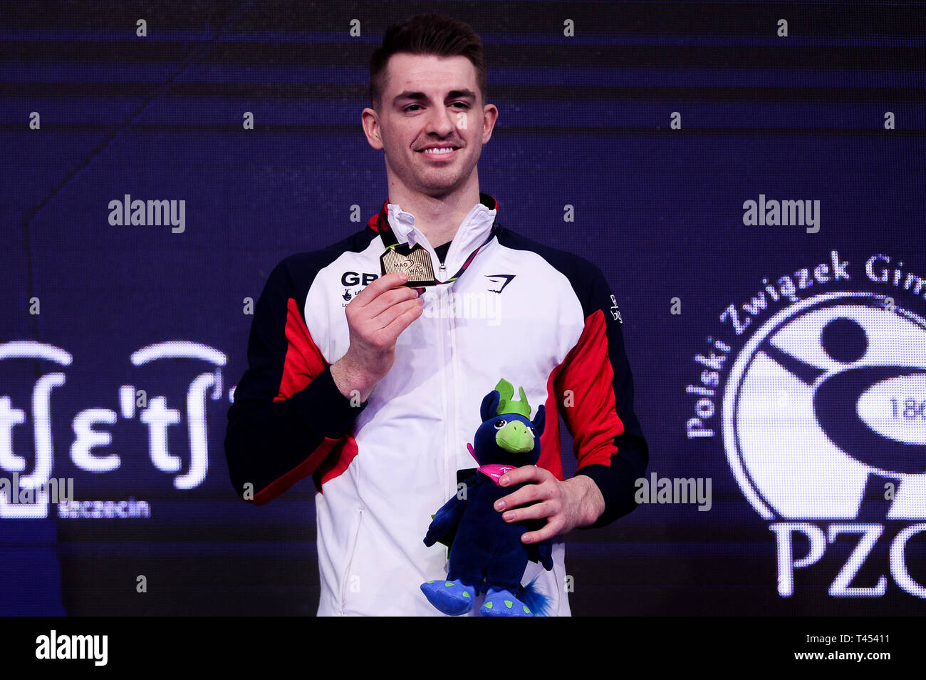 Szczecin, West Pomeranian, Poland. April 13, 2019 - Szczecin, West Pomeranian, Poland - Max Whitlock from Great Britain seen posing with a gold medal after winning the pommel horse final during the Apparatus Finals of 8th European Championships in Artistic Gymnastics Credit: Mateusz Slodkowski/SOPA Images/ZUMA Wire/Alamy Live News Stock Photo