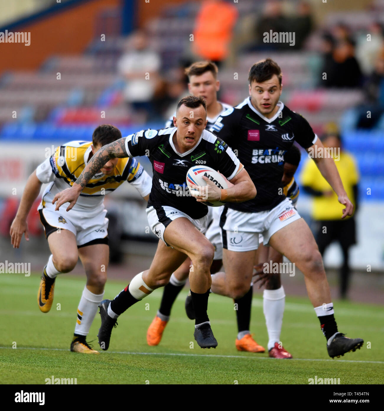 Halton Stadium, Widnes, UK. 13th Apr, 2019. Coral Challenge Cup rugby, Widnes Vikings versus York City Knights; Danny Craven of Widnes Vikings breaks through the York City Knights defensive line Credit: Action Plus Sports/Alamy Live News Stock Photo