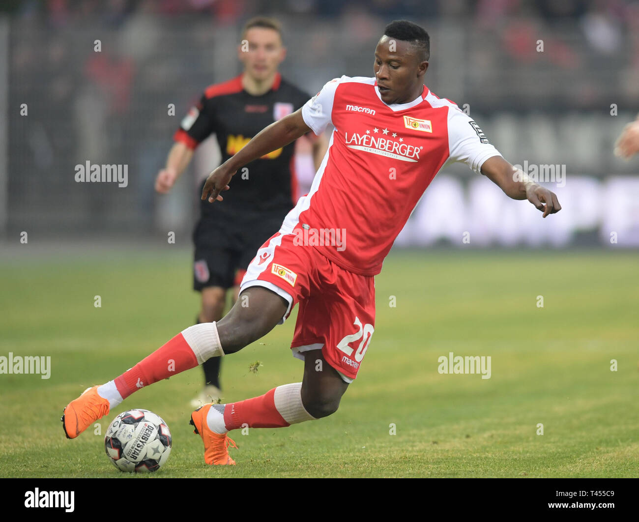 Berlin, Germany. 12th Apr, 2019. Soccer: 2nd Bundesliga, 1st FC Union Berlin - Jahn Regensburg, 29th matchday, at the Alte Försterei. Unions Suleiman Abdullahi on the ball. Credit: Jörg Carstensen/dpa - IMPORTANT NOTE: In accordance with the requirements of the DFL Deutsche Fußball Liga or the DFB Deutscher Fußball-Bund, it is prohibited to use or have used photographs taken in the stadium and/or the match in the form of sequence images and/or video-like photo sequences./dpa/Alamy Live News Stock Photo
