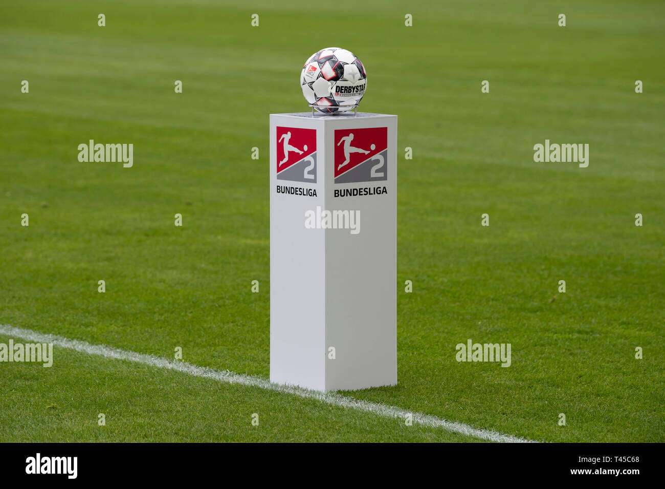 13 April 2019, Saxony-Anhalt, Magdeburg: Soccer: 2nd Bundesliga, 29th matchday, 1st FC Magdeburg - Darmstadt 98 in the MDCC-Arena. The ball lies on a stele with the inscription 'Bundesliga' on the playing field. Photo: Swen Pförtner/dpa - IMPORTANT NOTE: In accordance with the requirements of the DFL Deutsche Fußball Liga or the DFB Deutscher Fußball-Bund, it is prohibited to use or have used photographs taken in the stadium and/or the match in the form of sequence images and/or video-like photo sequences. Stock Photo