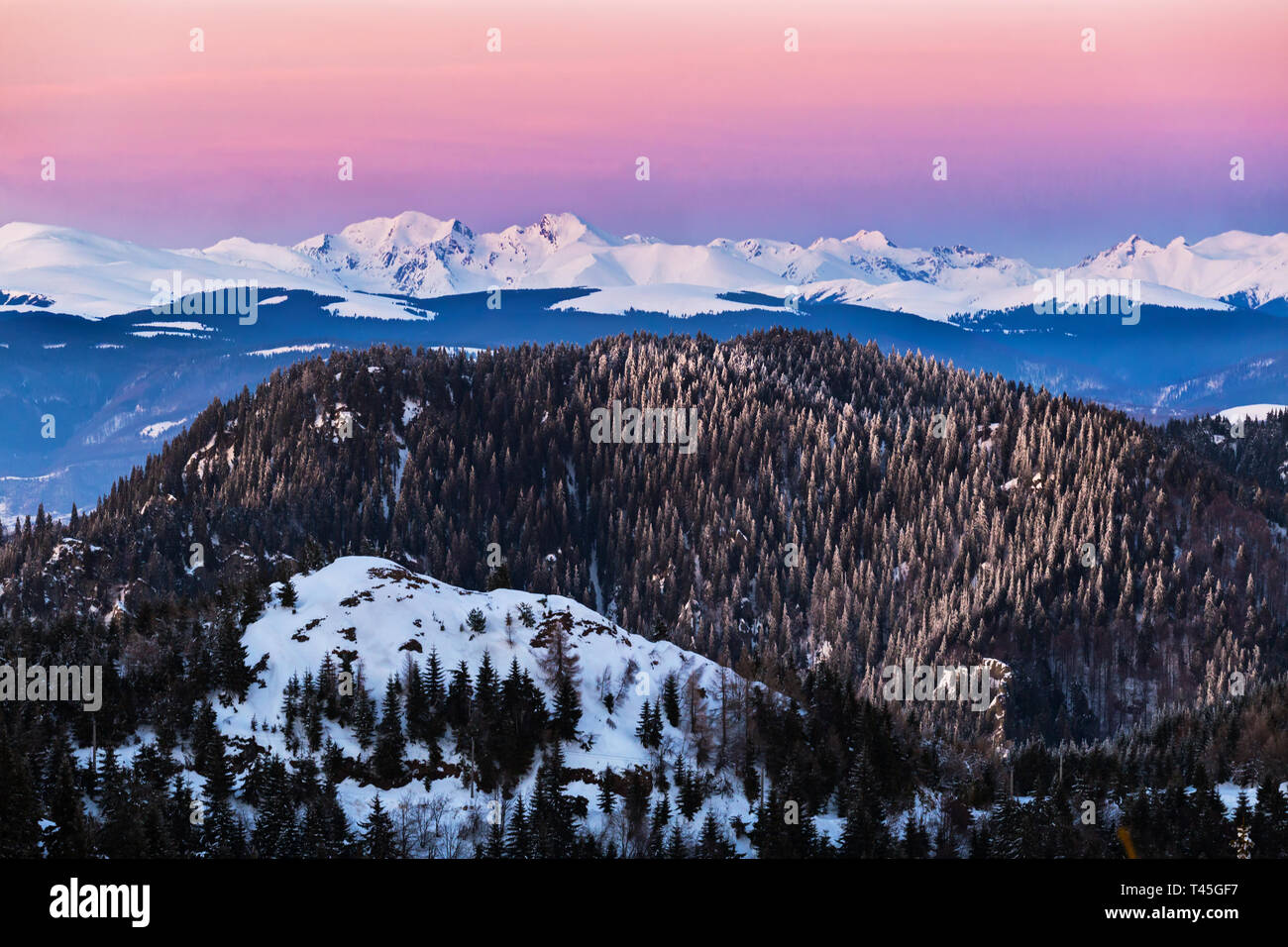 Picturesque mountain landscape during winter in Fagaras mounntain range, tallest in Romania Carpathians, at sunset Stock Photo