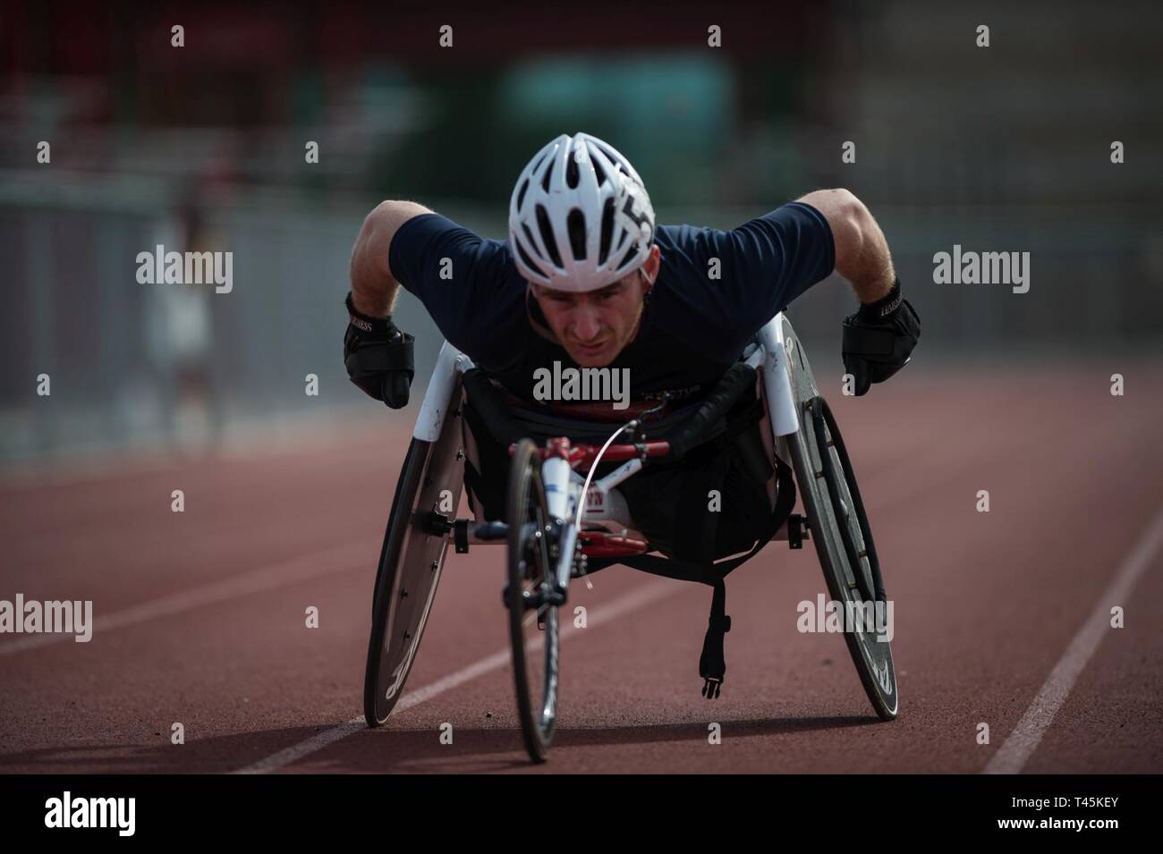 A Georgian athlete practices on the track during the 2019 Marine Corps Trials at Marine Corps Base Camp Pendleton, California, March 1. The Marine Corps Trials promotes recovery and rehabilitation through adaptive sports participation and develops camaraderie among recovering service members and veterans. Additionally, the competition is an opportunity for participants to demonstrate physical and mental achievements and serves as the primary venue to select Marine Corps participants for the DoD Warrior Games. Stock Photo
