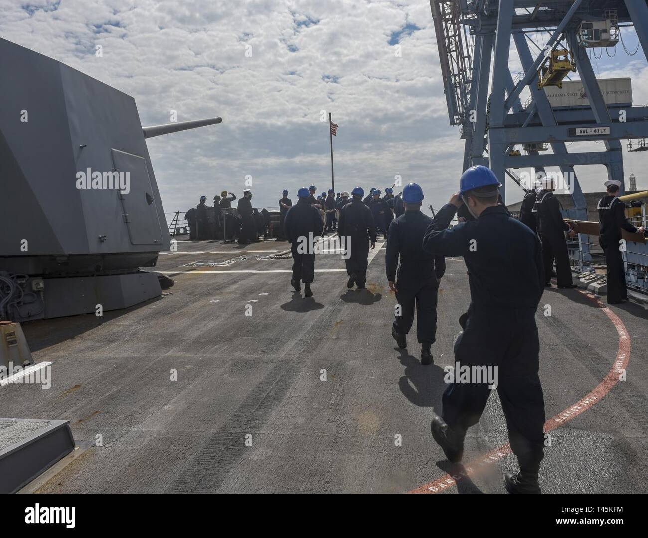 Ala., (March 1, 2019) Sailors man the rails and prepare to line handle ...