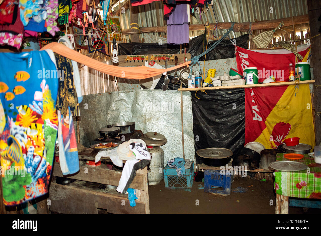 Kitchen with gas stove and pans in a Kuna home (traditional cabana) in Carti Island; Guna Yala indigenous villages. San Blas Islands, Panama. Oct 2018 Stock Photo