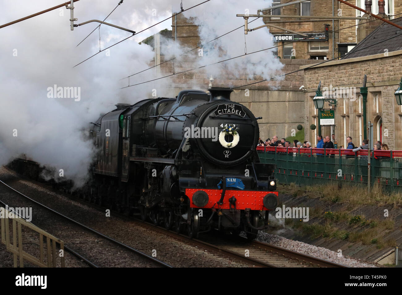Preserved LMS Stanier black five steam locomotive 44871 at the head of The Citadel special train arriving at Carnforth on the WCML on 13th April 2019. Stock Photo