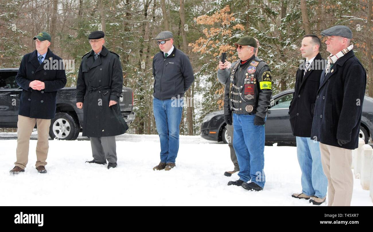 Veterans of the 1st Battalion 69th Infantry watch as a memorial wreath commemorating the Irish-American Soldiers of the Civil War is placed at the Soldiers Lot in Albany Rural Cemetery on March 10, 2019. Veterans of the New York National Guard's 1st  Battalion 69th Infantry who live in the Albany, N.Y.- area marked the graves of Irish-American Civil War Soldiers at Albany Rural Cemetery and St. Agnes Catholic Cemetery to acknowledge the link between their service and the 69th Infantry, which was historically an Irish-American unit and part of the Irish Brigade during the war. ( U.S. Army Natio Stock Photo