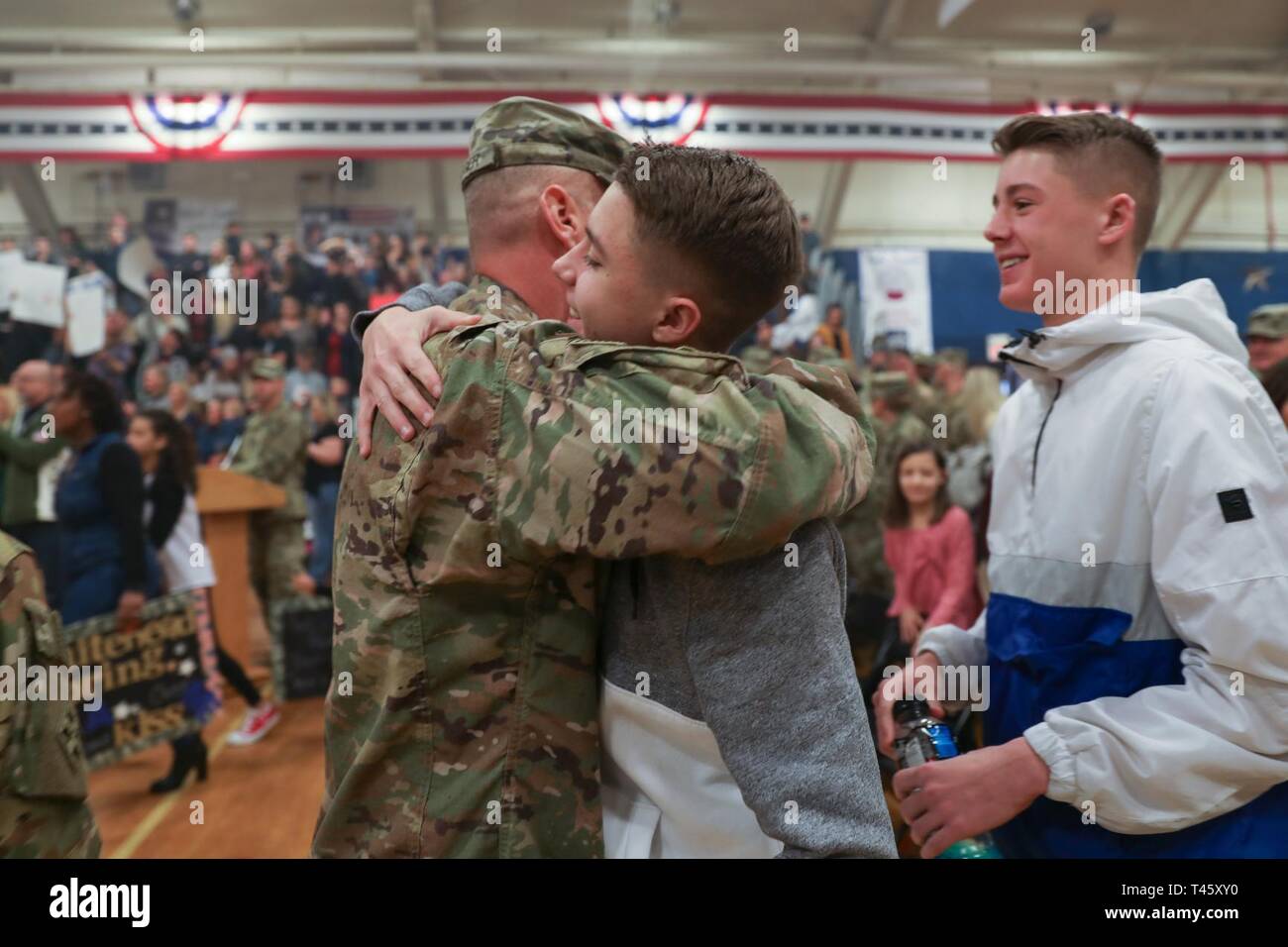 Lt Col Timothy Jaeger Commander Of 4th Attack Reconnaissance Battalion 4th Aviation Regiment 4th Combat Aviation Brigade 4th Infantry Division Embraces His Son After A Homecoming Ceremony At The William Bill Reed