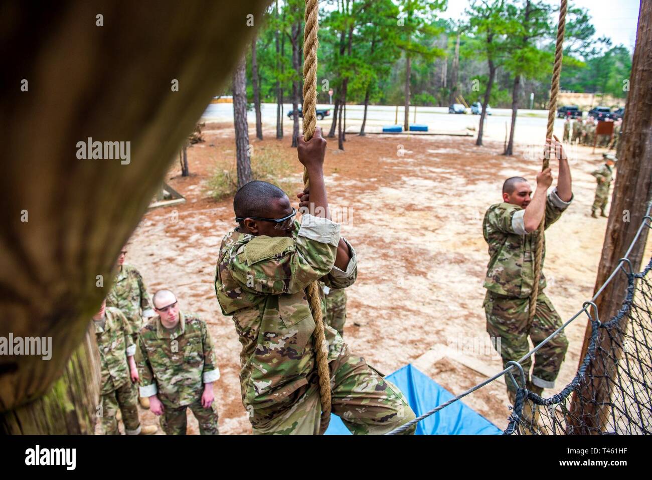 https://c8.alamy.com/comp/T461HF/fort-benning-ga-trainees-from-foxtrot-company-2nd-battalion-19th-infantry-regiment-negotiate-a-confidence-course-on-sand-hill-feb-27-2019-at-fort-benning-the-mission-of-the-219th-infantry-battalion-is-to-transform-civilians-into-disciplined-infantrymen-T461HF.jpg