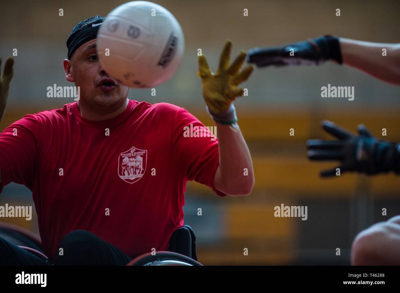 A U.S. Marine Corps athlete practices during a 2019 Marine Corps Trials wheelchair rugby practice at Marine Corps Base Camp Pendleton, California, Feb. 28. The Marine Corps Trials promotes recovery and rehabilitation through adaptive sports participation and develops camaraderie among recovering service members and veterans. Additionally, the competition is an opportunity for participants to demonstrate physical and mental achievements and serves as the primary venue to select Marine Corps participants for the DoD Warrior Games. Stock Photo