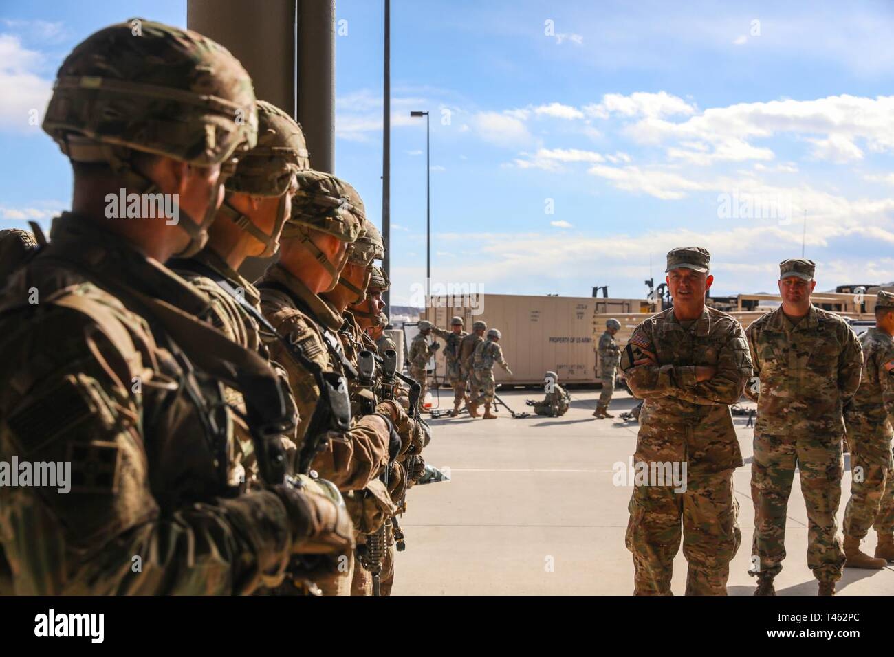 U.S. Army Lt. Gen. Paul E. Funk II, commander of III Corps, talks to ...