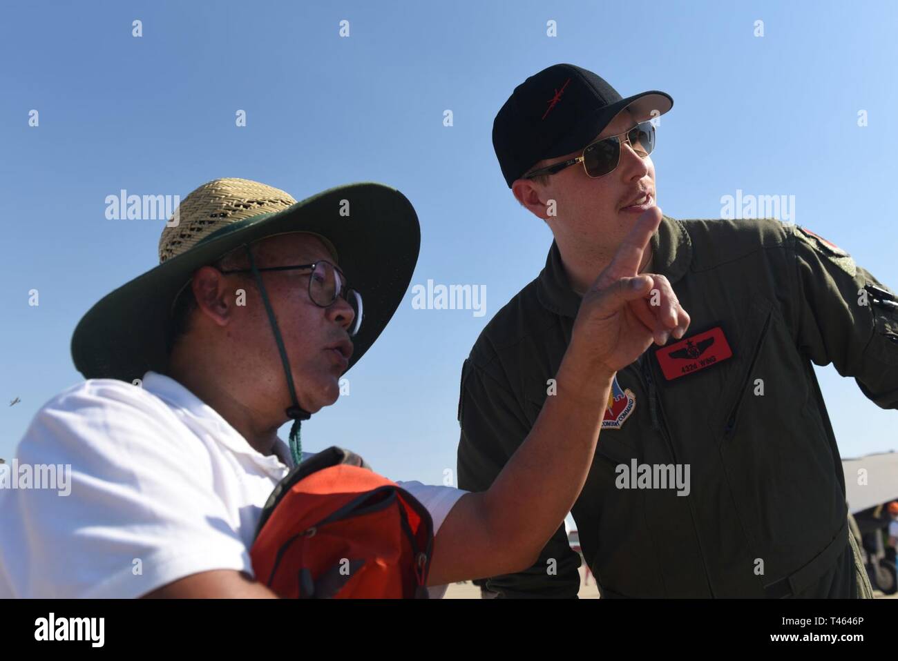 An airshow visitor asks Staff Sgt. Chandler, MQ-9 Reaper sensor ...