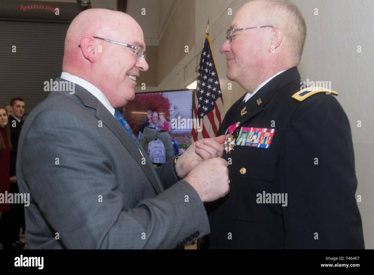 Col Edwin R Ramsey Retired Brig. Gen. Mitchell R. Chitwood (left) pins a retirement award ...
