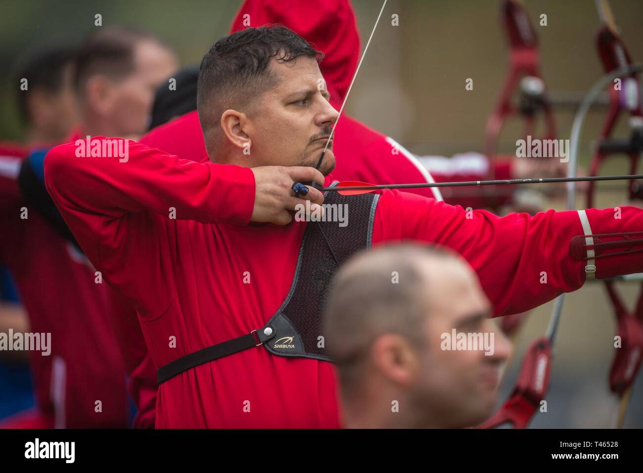 A U.S. Marine Corps athlete participates in the 2019 Marine Corps Trials archery competition at Marine Corps Base Camp Pendleton, California, March 2. The Marine Corps Trials promotes recovery and rehabilitation through adaptive sports participation and develops camaraderie among recovering service members and veterans. Additionally, the competition is an opportunity for participants to demonstrate physical and mental achievements and serves as the primary venue to select Marine Corps participants for the DoD Warrior Games. Stock Photo