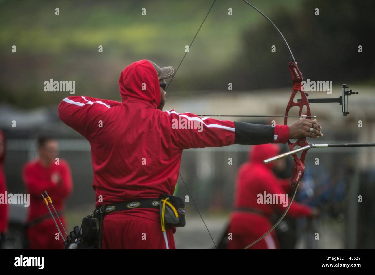 A U.S. Marine Corps athlete participates in the 2019 Marine Corps Trials archery competition at Marine Corps Base Camp Pendleton, California, March 2. The Marine Corps Trials promotes recovery and rehabilitation through adaptive sports participation and develops camaraderie among recovering service members and veterans. Additionally, the competition is an opportunity for participants to demonstrate physical and mental achievements and serves as the primary venue to select Marine Corps participants for the DoD Warrior Games. Stock Photo