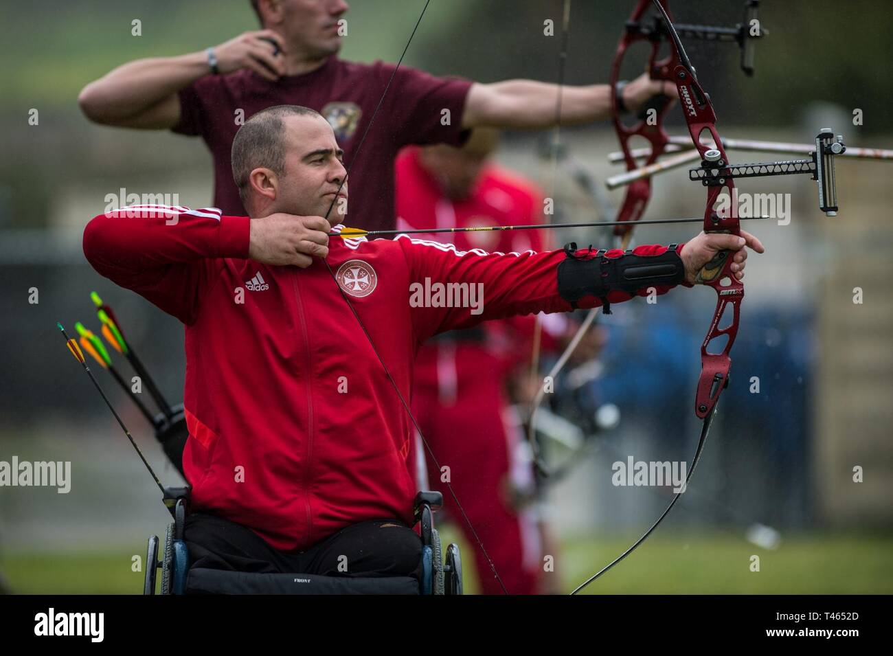 A Georgian athlete participates in the 2019 Marine Corps Trials archery competition at Marine Corps Base Camp Pendleton, California, March 2. The Marine Corps Trials promotes recovery and rehabilitation through adaptive sports participation and develops camaraderie among recovering service members and veterans. Additionally, the competition is an opportunity for participants to demonstrate physical and mental achievements and serves as the primary venue to select Marine Corps participants for the DoD Warrior Games. Stock Photo