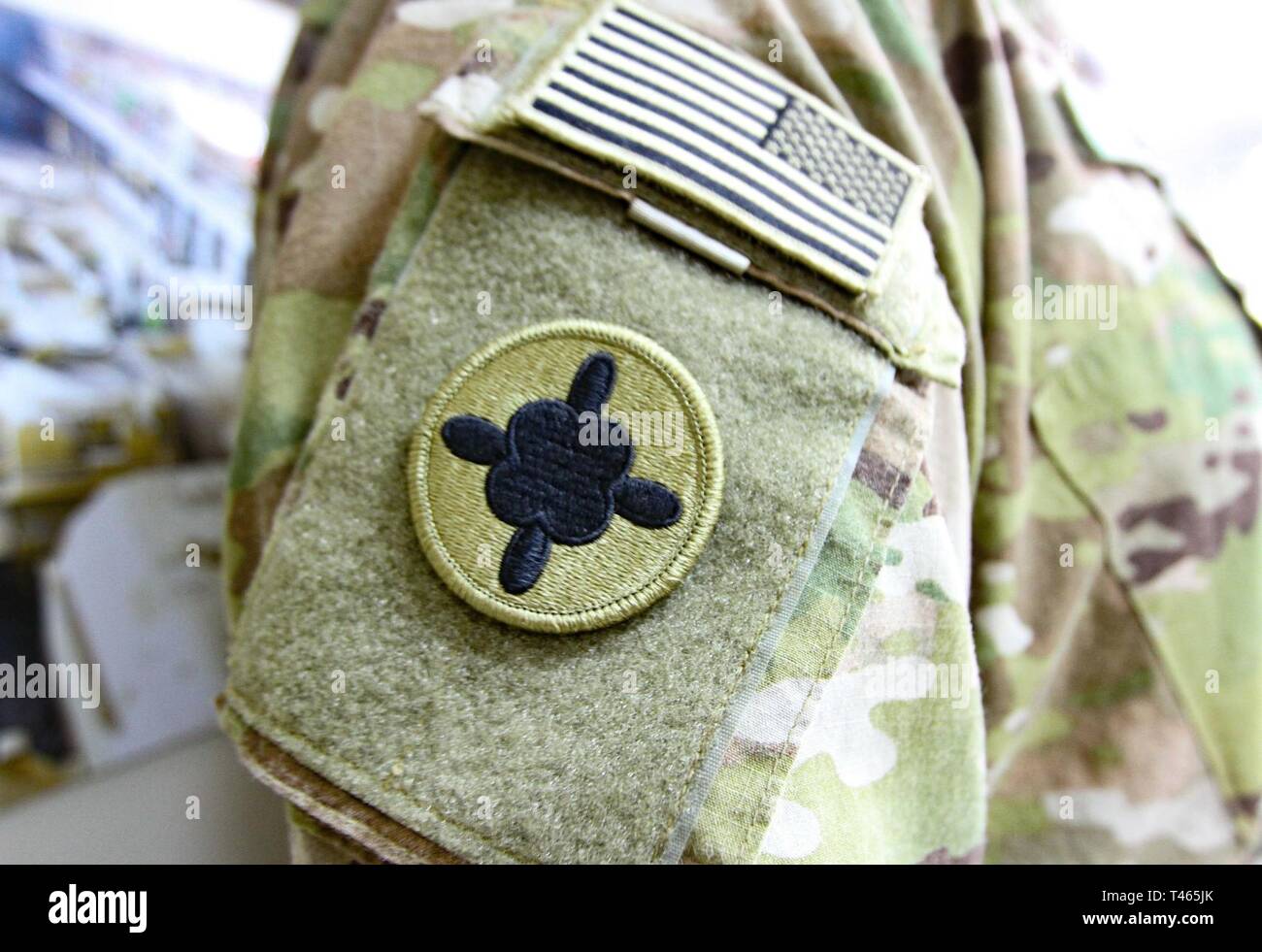 184th Sustainment Command shoulder sleeve insignia, or patch, is worn on a Soldier's right shoulder to show they deployed and served in a wartime environment with the 184th. Photo taken at Camp Arifjan Kuwait on Mar. 3, 2019. Stock Photo