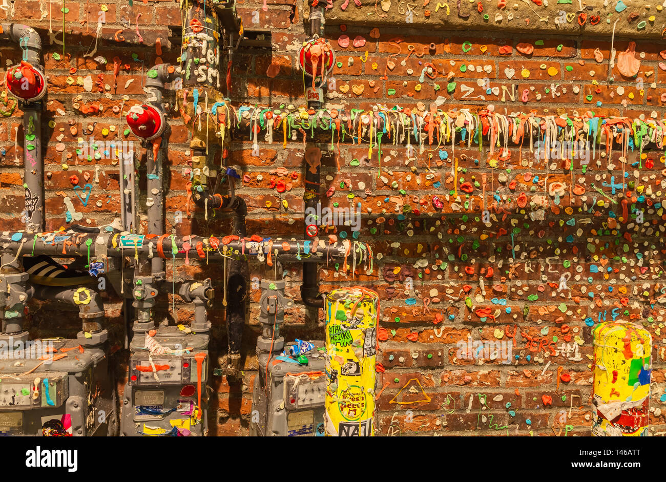 popular tourist attraction, the gum wall behind Pike Place Market in Seattle, Washington, United States, at night time. Stock Photo