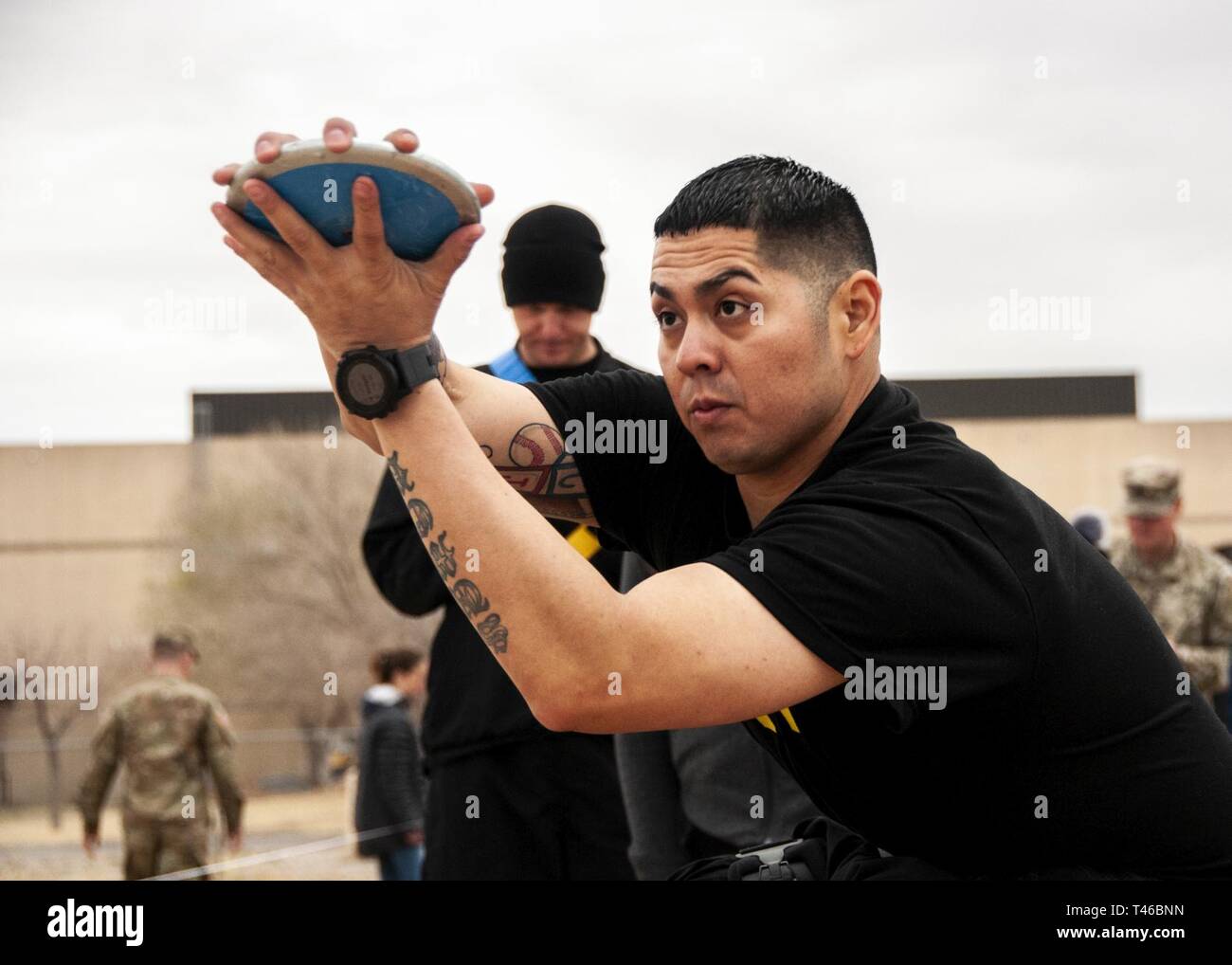 Sgt. Christopher Campos prepares for a discus throw during the field competition at the 2019 Army Trials, at Fort Bliss, Texas, March 11. Army Trials is an adaptive-sports competition taking place from March 5 - 16 with nearly 100 wounded, ill and injured active-duty Soldiers and veterans competing in 14 different adaptive sports for the opportunity to represent Team Army at the 2019 Department of Defense Warrior Games in Tampa, Florida. Stock Photo
