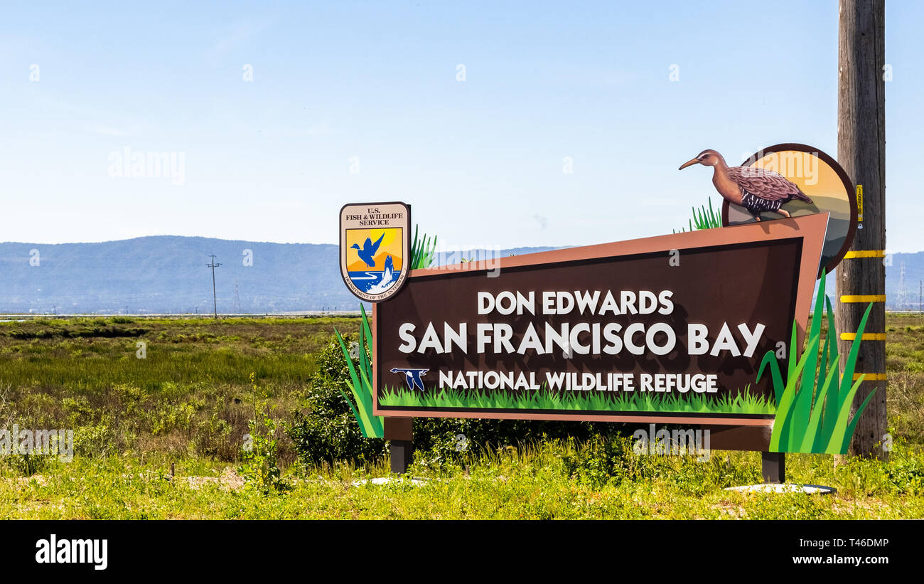 April 12, 2019 Fremont / CA / USA - Don Edwards San Francisco Bay National Wildlife Refuge sign; wetlands visible in the background; East San Francisc Stock Photo