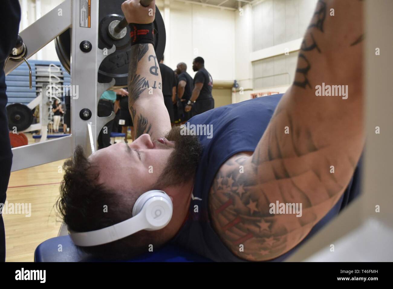 Staff Sgt. retired Ross Alewine warms up prior to the powerlifting competition during the 2019 Army Trials, at Fort Bliss, Texas, Mar. 8. The 2019 Army Trials at Fort Bliss, Texas is an adaptive sports competition from Mar. 5-16 with over 100 wounded, ill and injured active-duty Soldiers and veterans competing in 14 different sports for the opportunity to represent Team Army at the 2019 Department of Defense Warrior Games in Tampa, Florida. Stock Photo