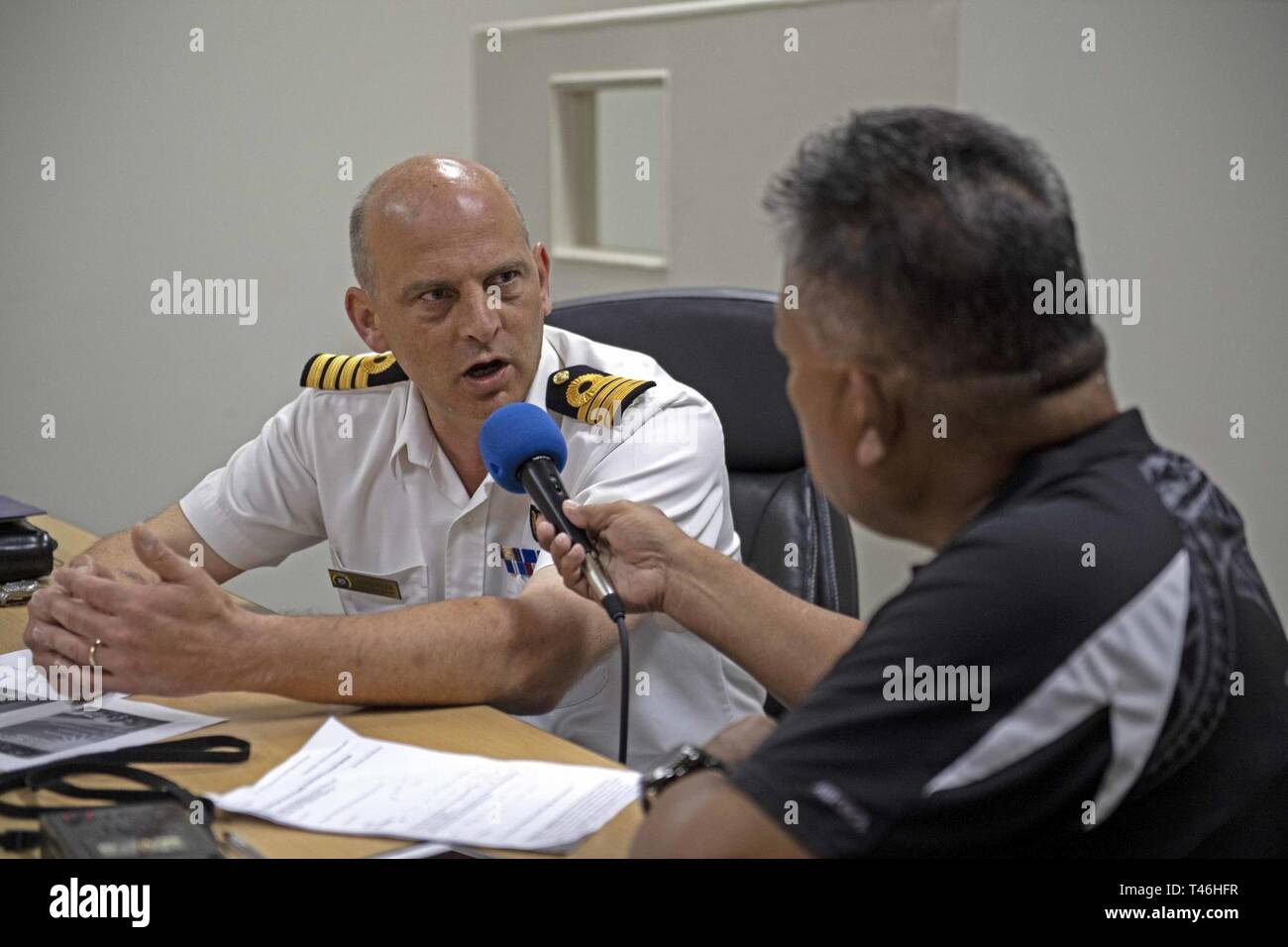 MAJURO, Republic of the Marshall Islands (March 12, 2019) Royal Navy Capt.  Paddy Allen, director of mission, is interviewed by Antari Elbon of Radio  Marshalls V7AB about Pacific Partnership 2019. Pacific Partnership,